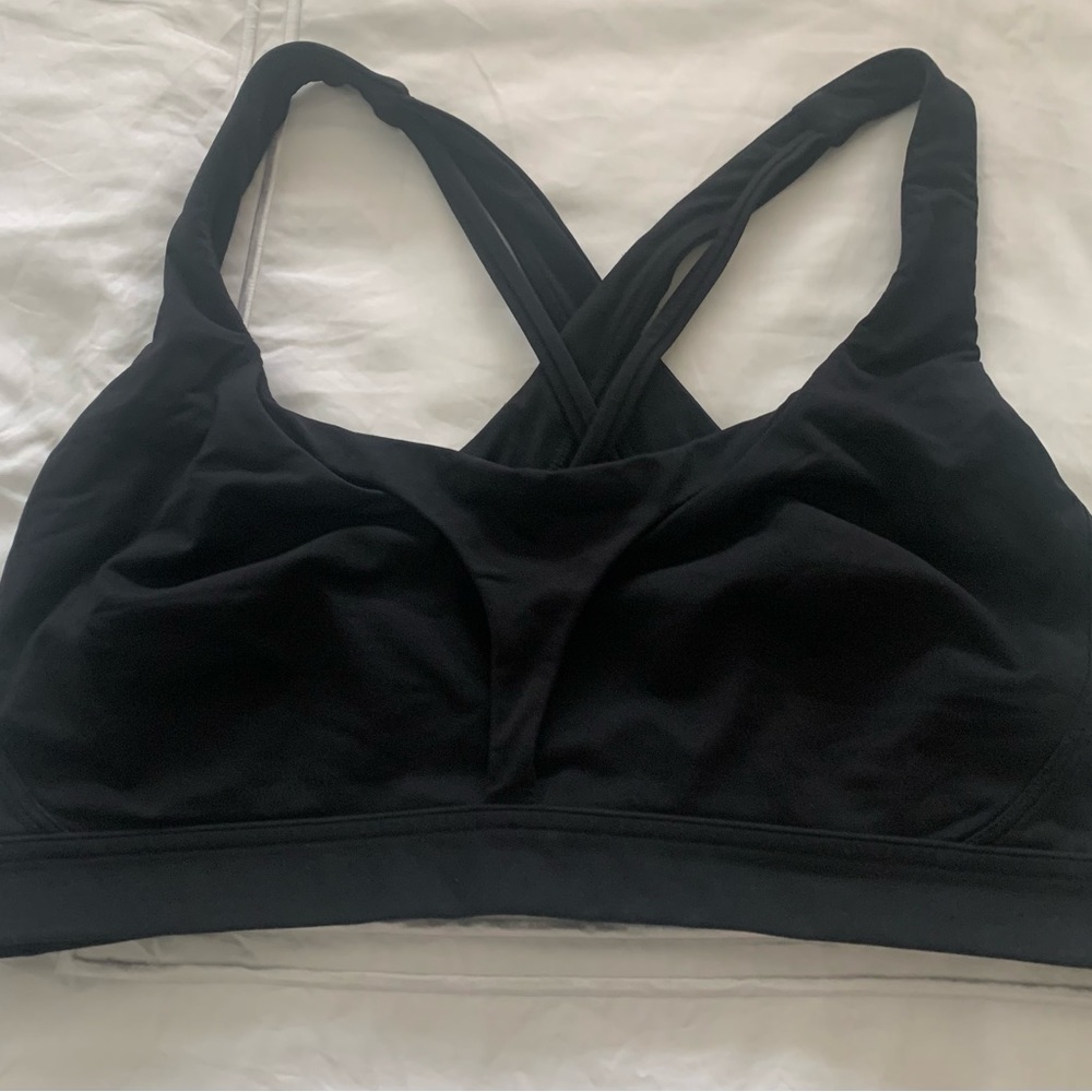 Lululemon black sports bra. Light worn. Bra pads removed. Size 12